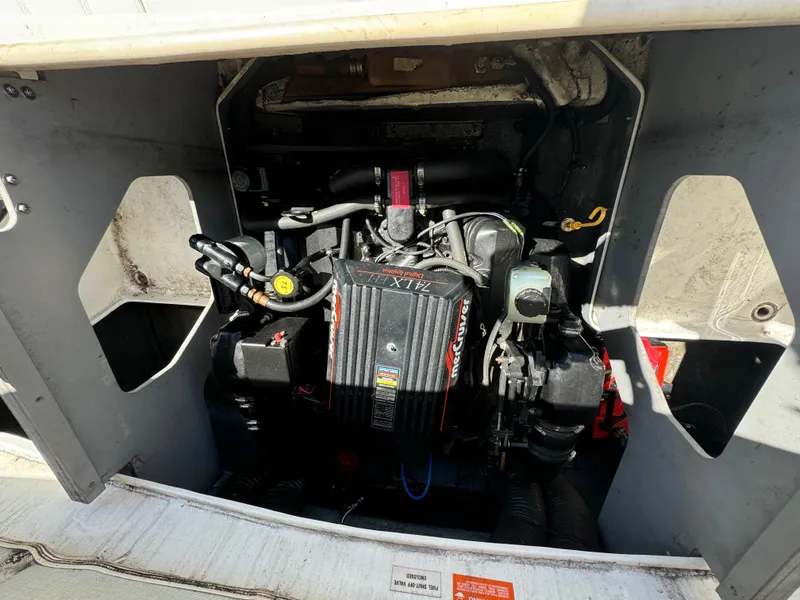 Slide: The Image of Engine compartment of a 1996 Sea Ray 260 Bow Rider boat. - 20