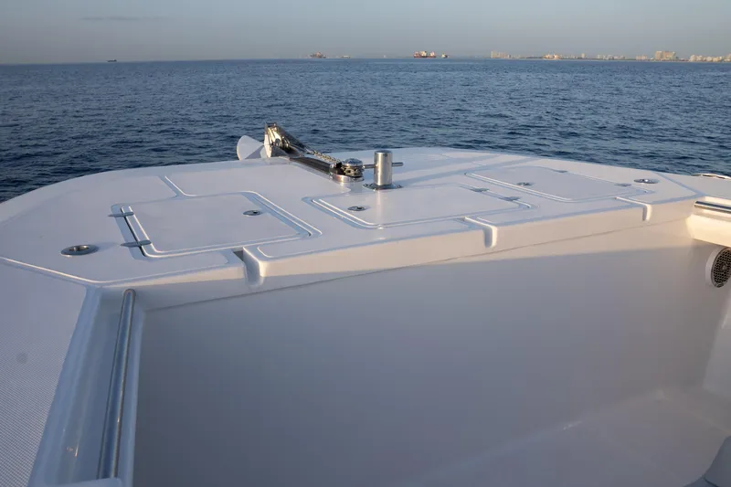 Slide: The Image of 2024 Hammer Yachts 35 deck overlooking calm ocean waters. - 17