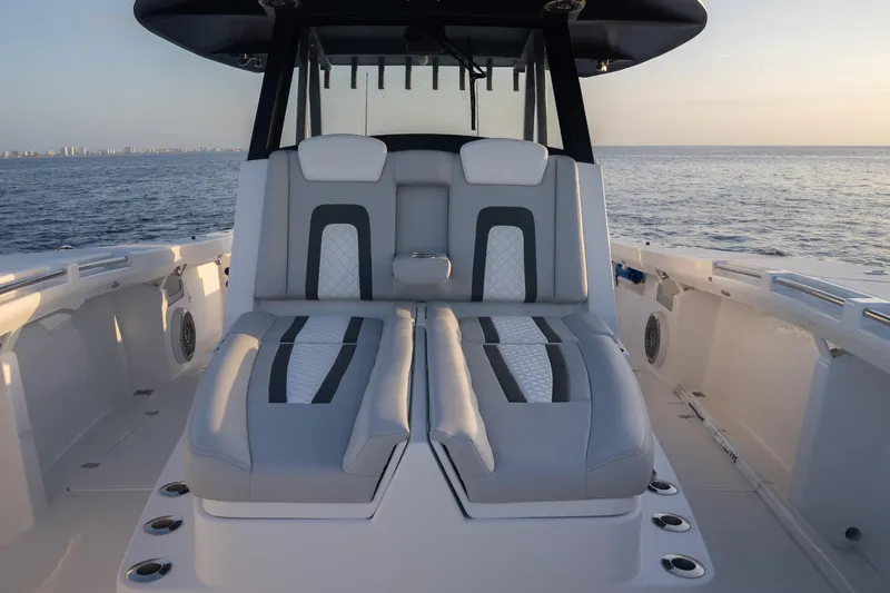 Slide: The Image of 2024 Hammer Yachts 35 interior seating with ocean view, showcasing luxury and comfort. - 3