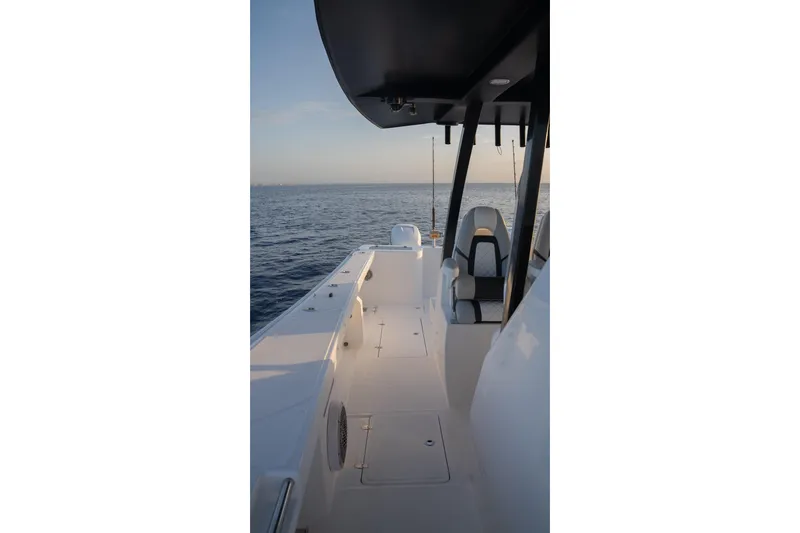 Slide: The Image of 2024 Hammer Yachts 35 boat deck with ocean view at sunset. - 4