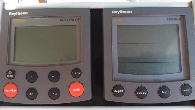 Slide: The Image of Raytheon autopilot and tridata displays on a 1999 Mainship 350 Trawler. - 21