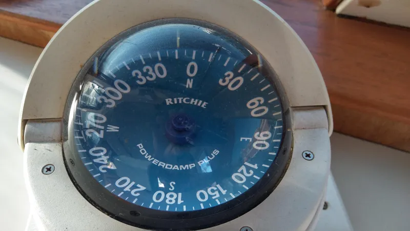 Slide: The Image of Ritchie compass on 1999 Mainship 350 Trawler boat. - 24