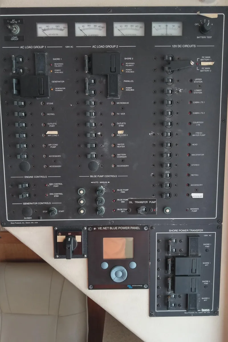 Slide: The Image of Electrical control panel of a 1999 Mainship 350 Trawler boat. - 32
