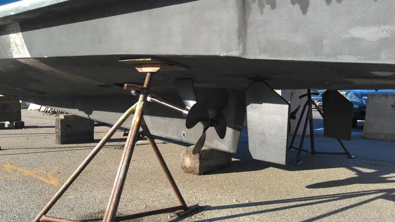 Slide: The Image of 1999 Mainship 350 Trawler hull and propeller on dry dock. - 6