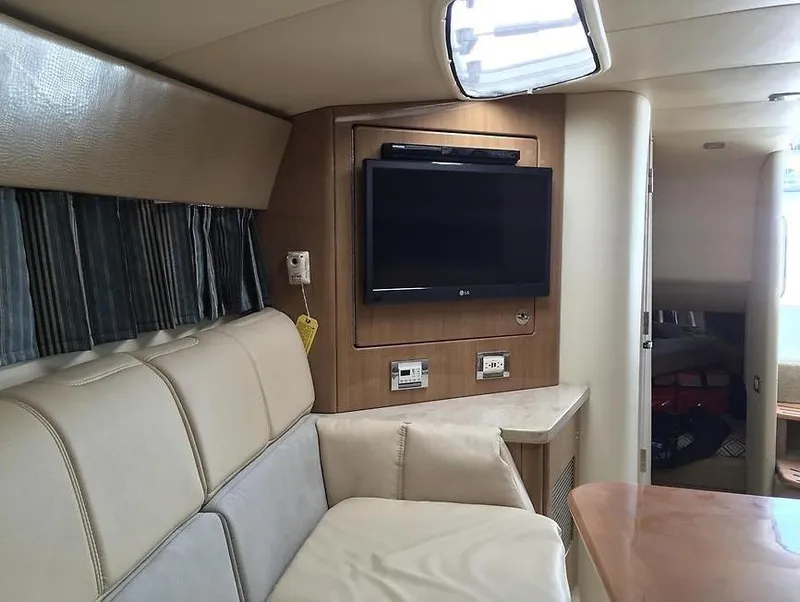 Slide: The Image of Interior of 2014 Formula 400 Super Sport yacht with TV and seating area. - 21