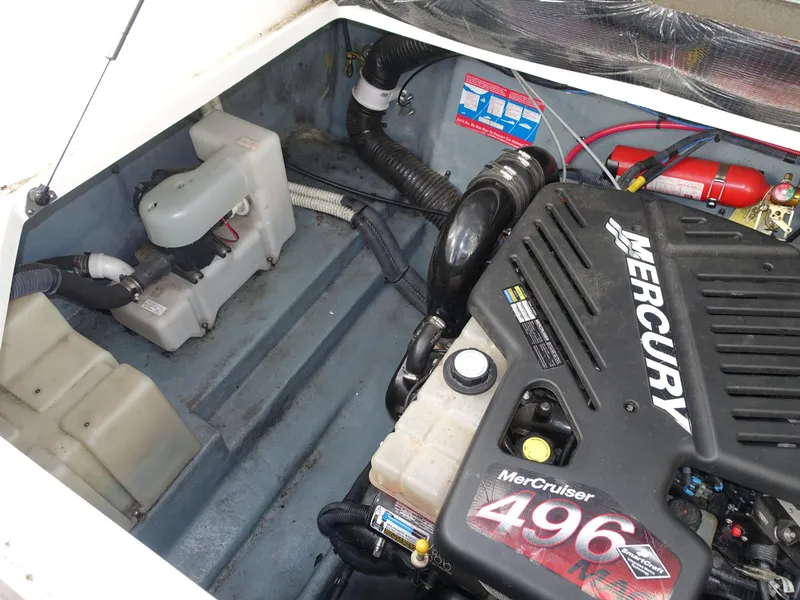 Slide: The Image of 2004 Sea Ray 280 Sundancer engine compartment with Mercury MerCruiser 496 engine. - 28