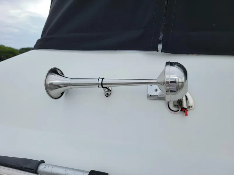 Slide: The Image of Close-up of a boat horn on a 2003 Robertson & Caine Lion 46 yacht. - 11