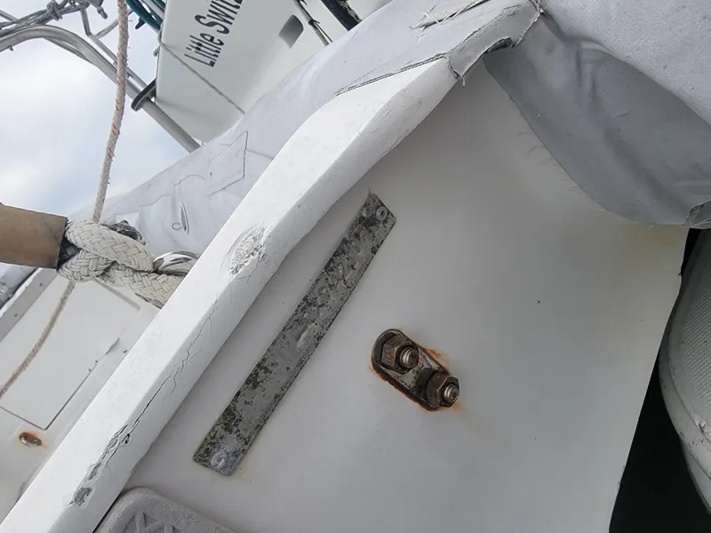 Slide: The Image of Close-up of 2003 Robertson & Caine Lion 46 sailboat deck with ropes and fittings. - 25