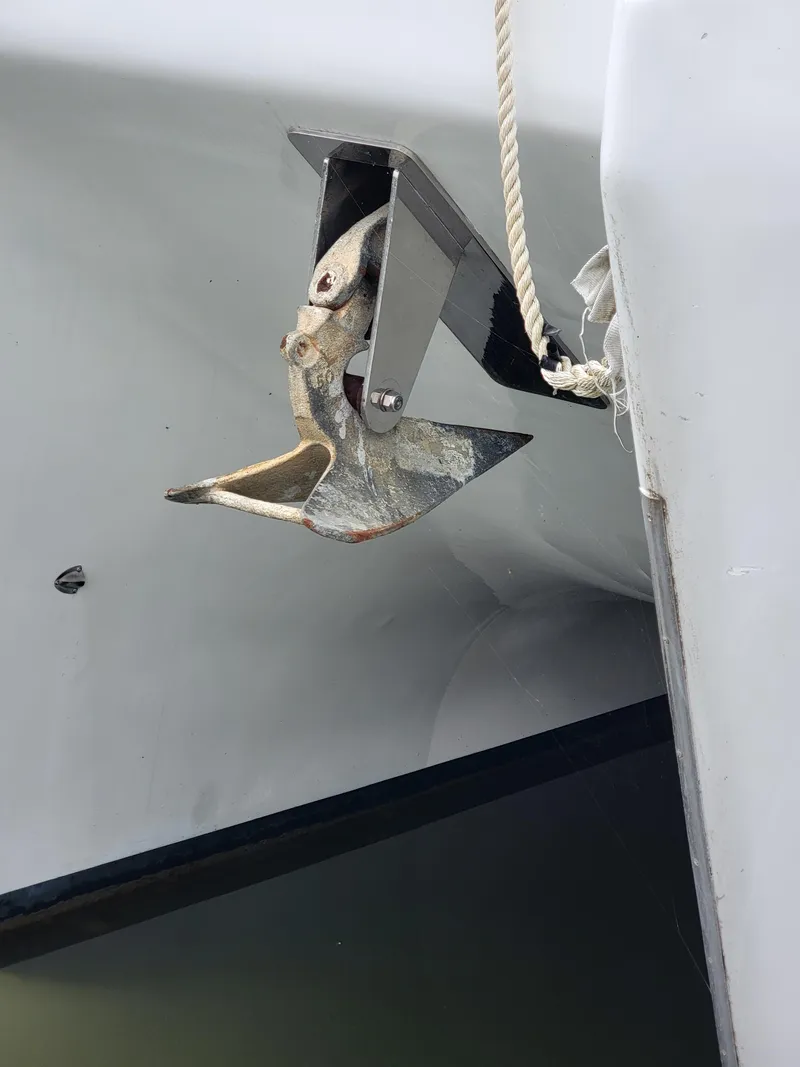 Slide: The Image of Anchor of 2003 Robertson & Caine Lion 46 catamaran, secured with rope. - 29