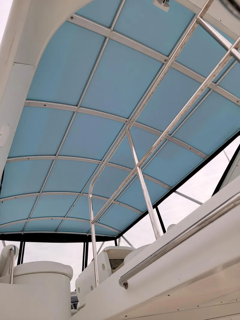 Slide: The Image of Interior view of 2003 Robertson & Caine Lion 46 catamaran with blue canopy. - 31