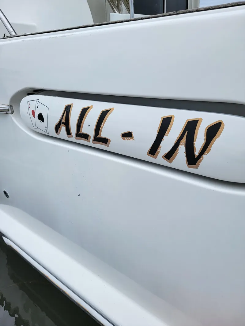 Slide: The Image of Close-up of "ALL-IN" text on 2003 Robertson & Caine Lion 46 yacht. - 6