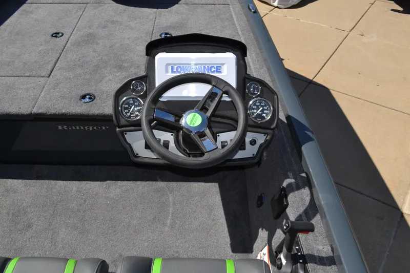 Slide: The Image of 2024 Ranger RT188 boat dashboard with Lowrance electronics and steering wheel. - 3