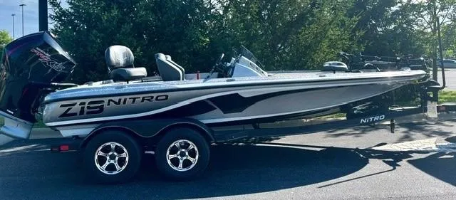 Slide: The Image of 2024 Nitro Z19 Pro fishing boat on trailer, side view. - 0