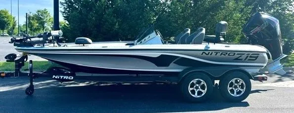 Slide: The Image of 2024 Nitro Z19 Pro fishing boat on trailer, side view. - 1