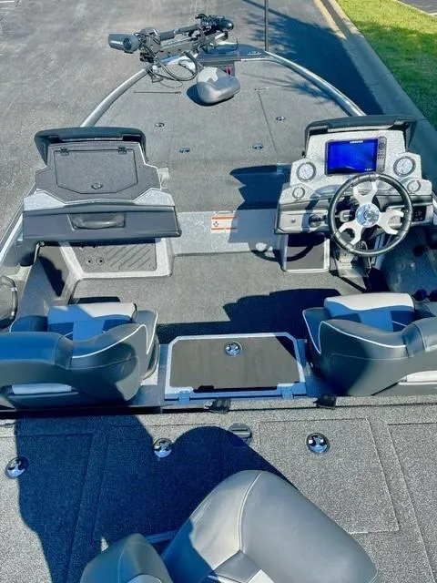 Slide: The Image of 2024 Nitro Z19 Pro fishing boat cockpit with advanced navigation system. - 3
