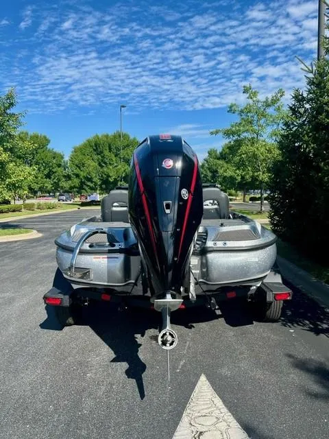 Slide: The Image of 2024 Nitro Z19 Pro boat on trailer, rear view, parked outdoors. - 5