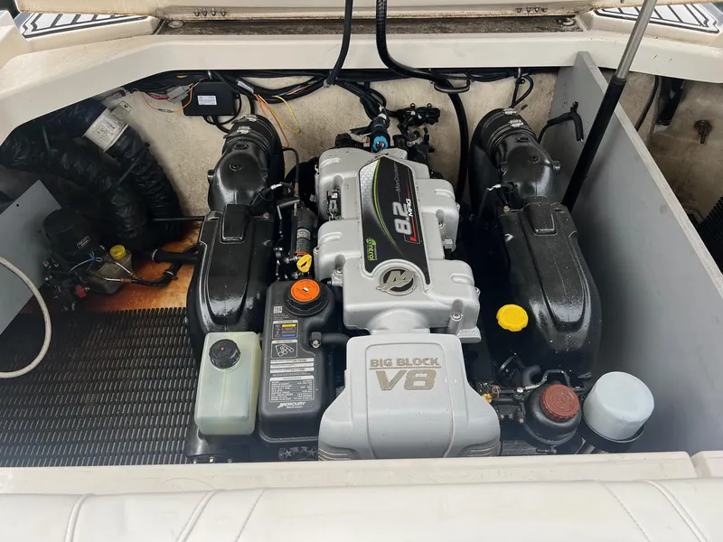 Slide: The Image of 2014 Monterey 288 SS boat engine compartment with Big Block V8 engine. - 23