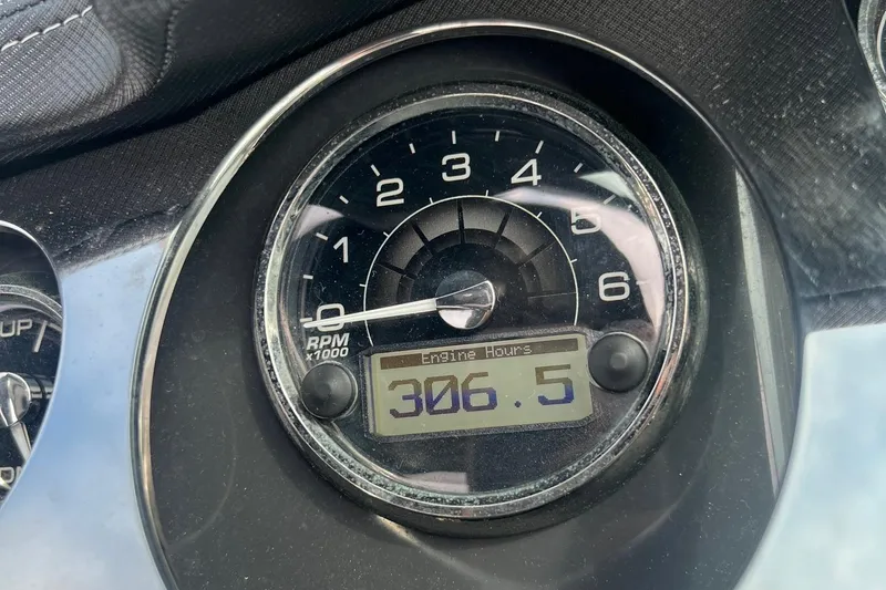 Slide: The Image of Close-up of 2014 Monterey 288 SS tachometer showing 306.5 engine hours. - 33