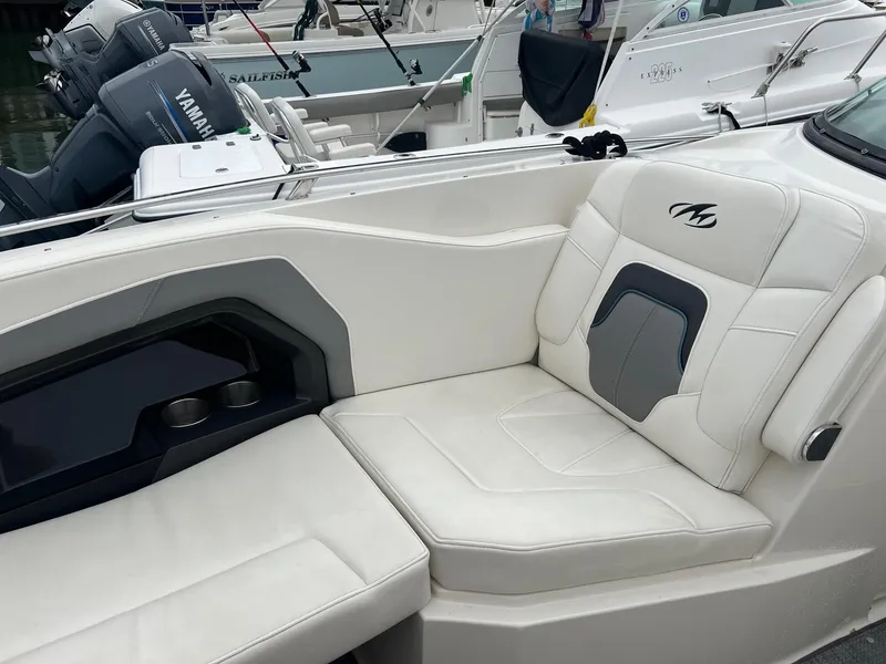Slide: The Image of 2014 Monterey 288 SS boat with white leather seating and cup holders. - 8
