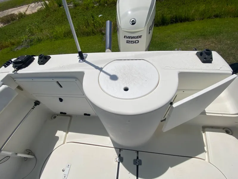Slide: The Image of 1999 Aquasport 245 Explorer boat deck with Evinrude 250 outboard motor. - 7