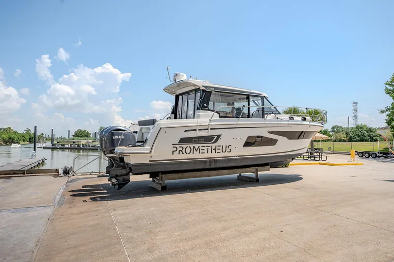 Slide: The Image of 2021 Jeanneau NC Weekender 1095 boat on a dock. - 11