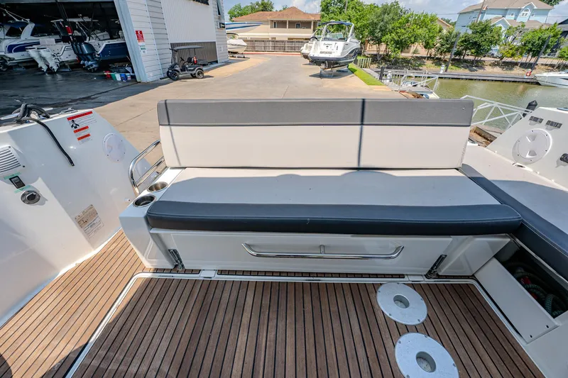Slide: The Image of 2021 Jeanneau NC Weekender 1095 boat with rear seating and teak deck. - 21