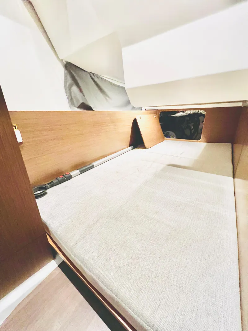 Slide: The Image of Interior cabin of 2021 Jeanneau NC Weekender 1095 with a cozy bed. - 36