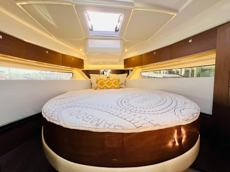 Slide: The Image of 2021 Jeanneau NC Weekender 1095 cabin with round bed and skylight. - 37