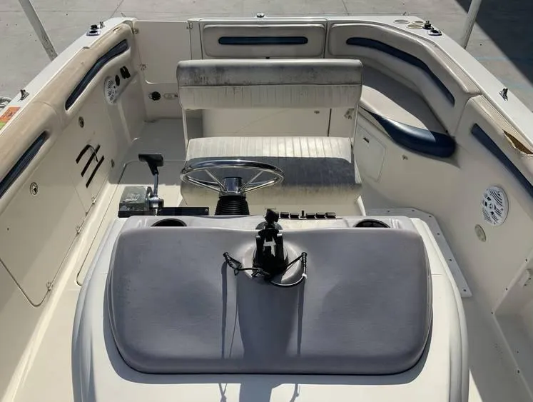 Slide: The Image of 1997 Regal 200 DESTINY boat interior with steering wheel and seating. - 10