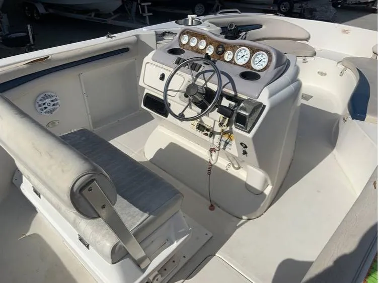 Slide: The Image of 1997 Regal 200 DESTINY boat interior with steering wheel and dashboard. - 4