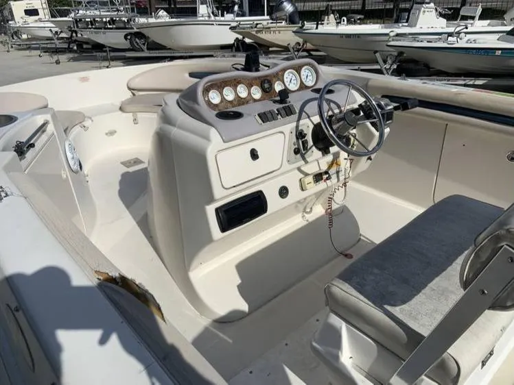 Slide: The Image of 1997 Regal 200 DESTINY boat interior with steering wheel and control panel. - 5