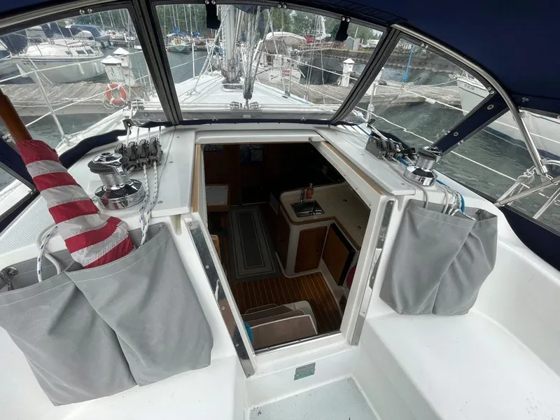 Slide: The Image of Cockpit view of 2000 Catalina 310 sailboat, showing interior cabin and deck details. - 18