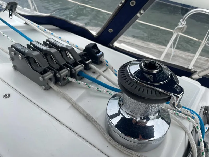 Slide: The Image of Winch and rope clutches on a 2000 Catalina 310 sailboat deck. - 20