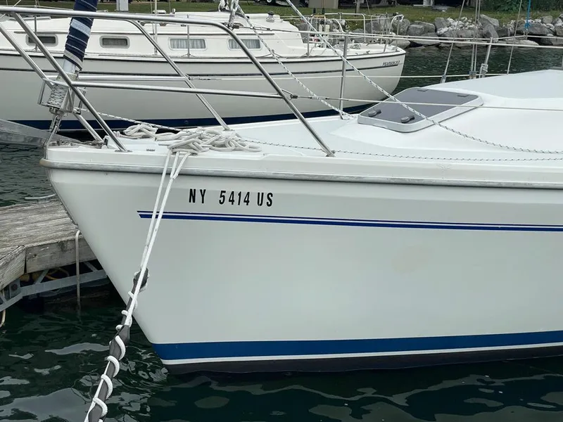 Slide: The Image of Catalina 310 sailboat, 2000 model, docked with visible registration number NY 5414 US. - 4