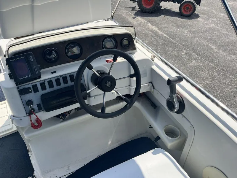 Slide: The Image of 1995 Hurricane FunDeck 240 boat with Yamaha Saltwater Series outboard motor. - 7