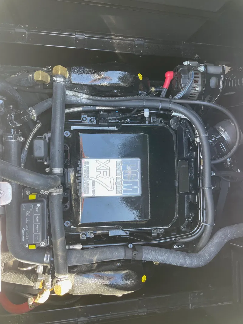 Slide: The Image of 2021 Nautique Super Air Nautique G25 engine compartment with PCM XR7 engine. - 16
