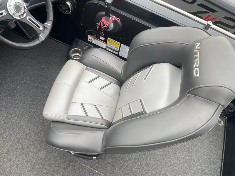 Slide: The Image of 2019 Nitro ZV19 Sport boat seat and steering wheel interior. - 15