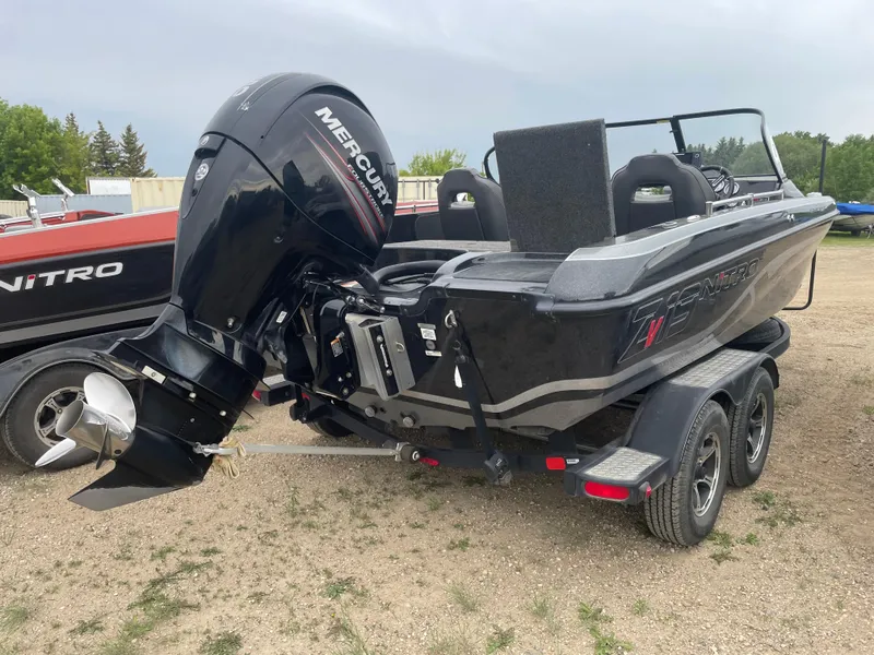 Slide: The Image of 2019 Nitro ZV19 Sport boat with Mercury outboard motor on a trailer. - 3