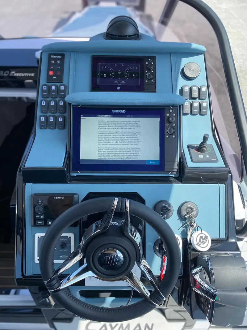 Slide: The Image of 2025 Ranieri CAYMAN 38.0 EXECUTIVE boat dashboard with advanced navigation controls. - 12