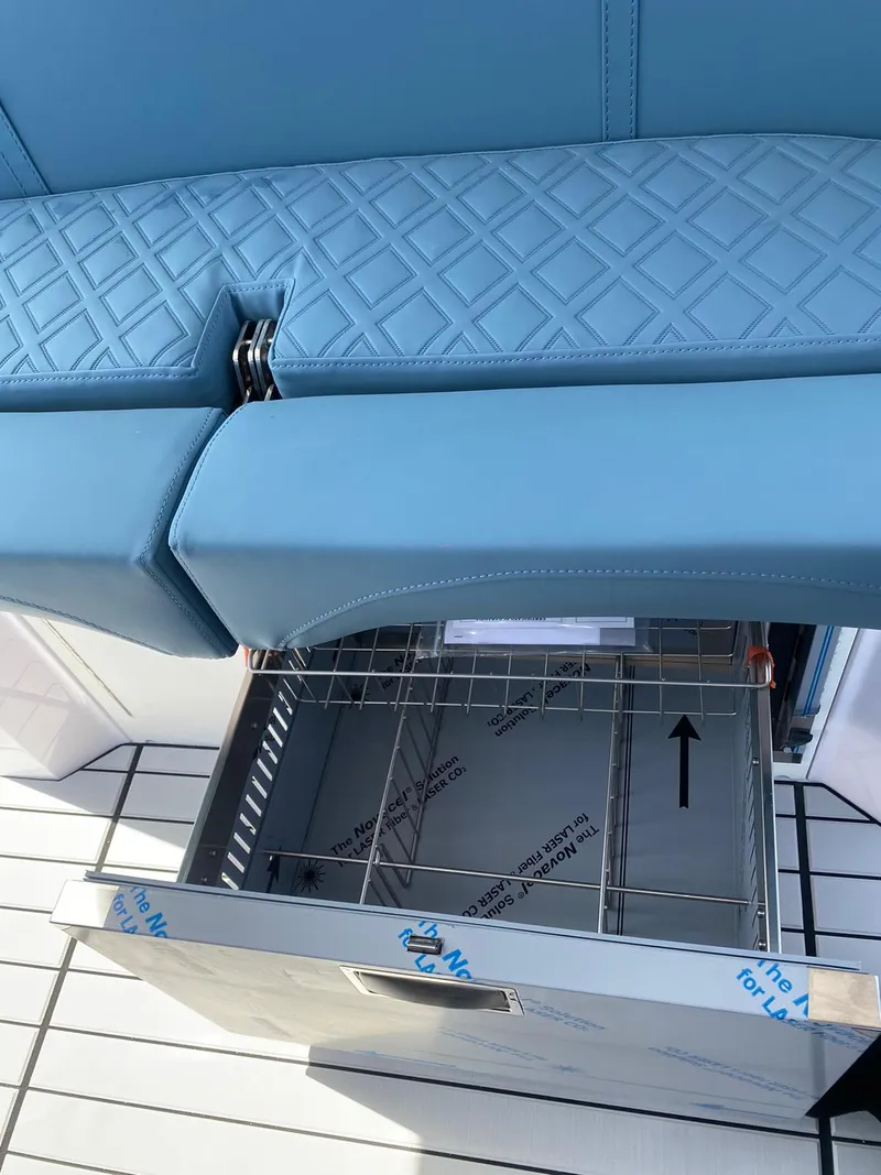 Slide: The Image of Blue leather seat with storage drawer on Ranieri CAYMAN 38.0 EXECUTIVE 2025 boat. - 26