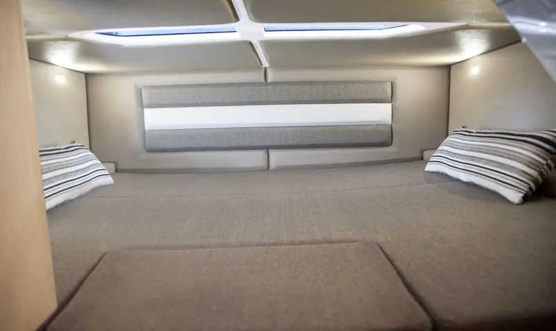 Slide: The Image of Interior cabin of the 2025 Ranieri CAYMAN 38.0 EXECUTIVE with cozy bedding. - 29