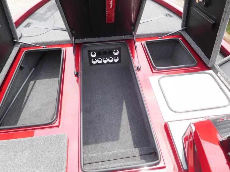 Slide: The Image of 2024 Vexus AVX 1880 V2 boat interior storage compartments and rod holders. - 5