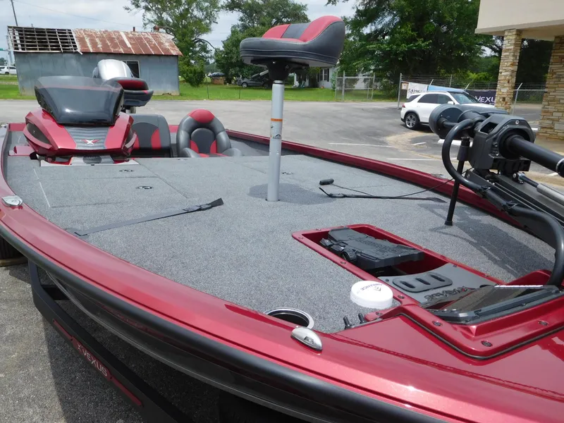 Slide: The Image of 2024 Vexus AVX 1880 V2 fishing boat with red and gray interior. - 8