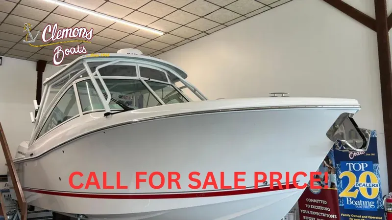 The Image of 2025 Albemarle 27 Dual Console boat displayed indoors, available for sale at Clemons Boats. - 0