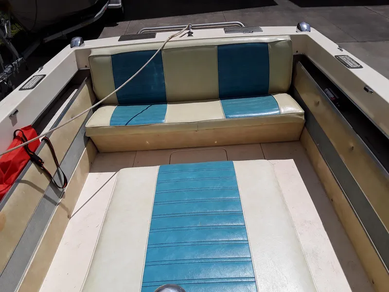 Slide: The Image of 1968 Correct Craft Southwind boat interior with blue and white seating. - 3