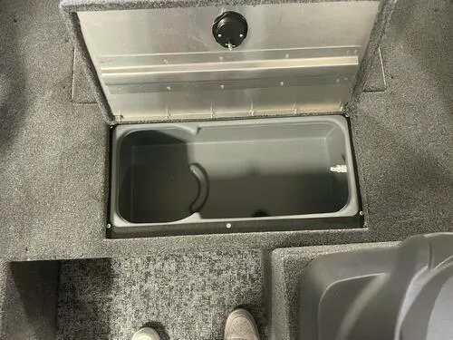 Slide: The Image of 2024 Tracker Super Guide V-16 SC boat storage compartment. - 13