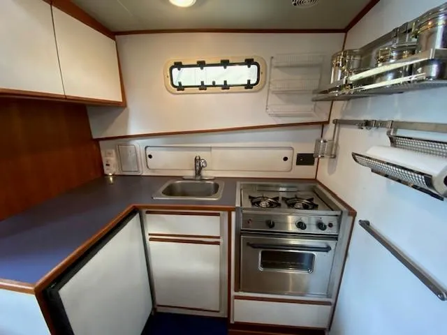 Slide: The Image of Stainless sink and Propane range - 19