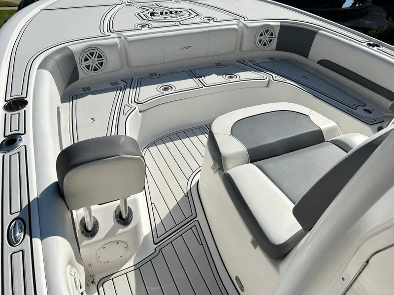 Slide: The Image of 2018 Tidewater 2700 Carolina Bay boat interior with cushioned seating and sleek design. - 4