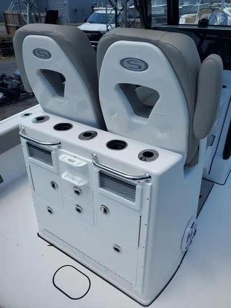 Slide: The Image of 2024 Sportsman Masters 267OE Bay boat seating and storage console. - 7