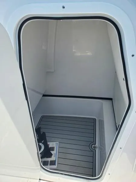Slide: The Image of 2024 Sportsman Masters 267OE Bay boat storage compartment. - 9
